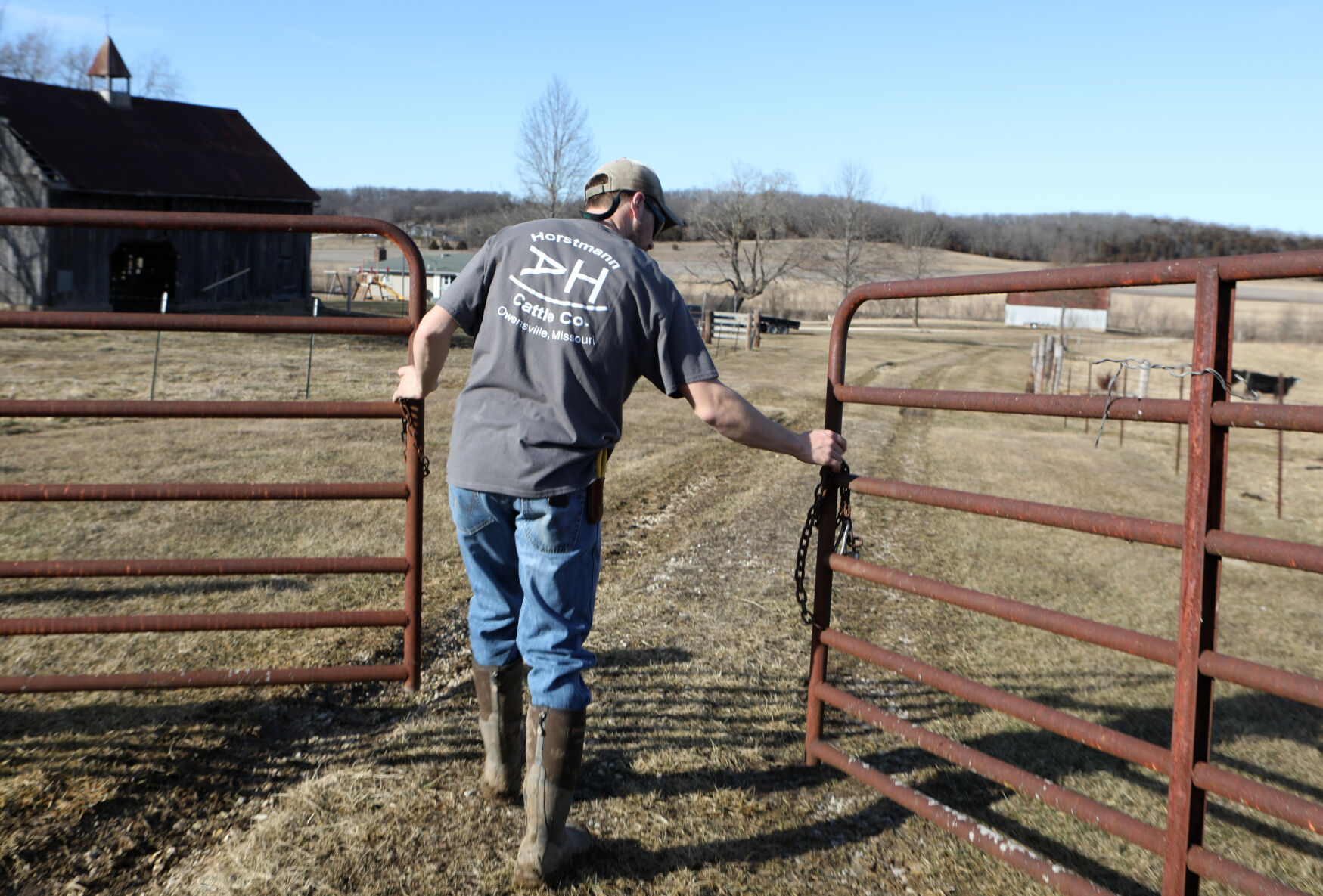 August Horstmann opens a gate